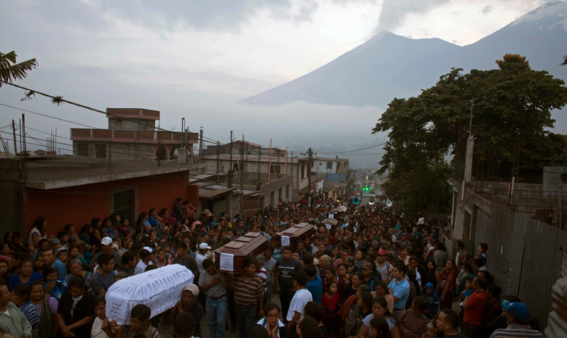The coffins of several people who were killed during the eruption of Mount Fuego this past Sunday in Guatemala.